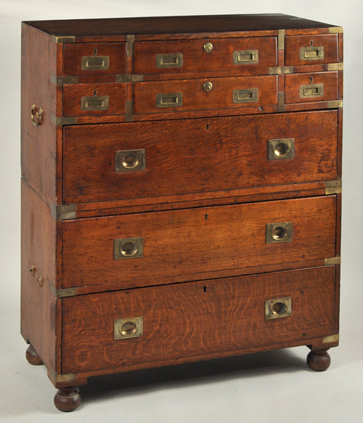Brass mounted oak campaign chest: $1,845. Woodbury Auction image.